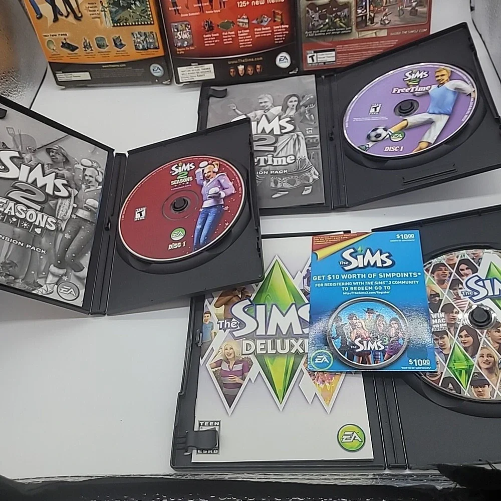 The Sims Lot of 13‎ PC Games and Expansion Packs